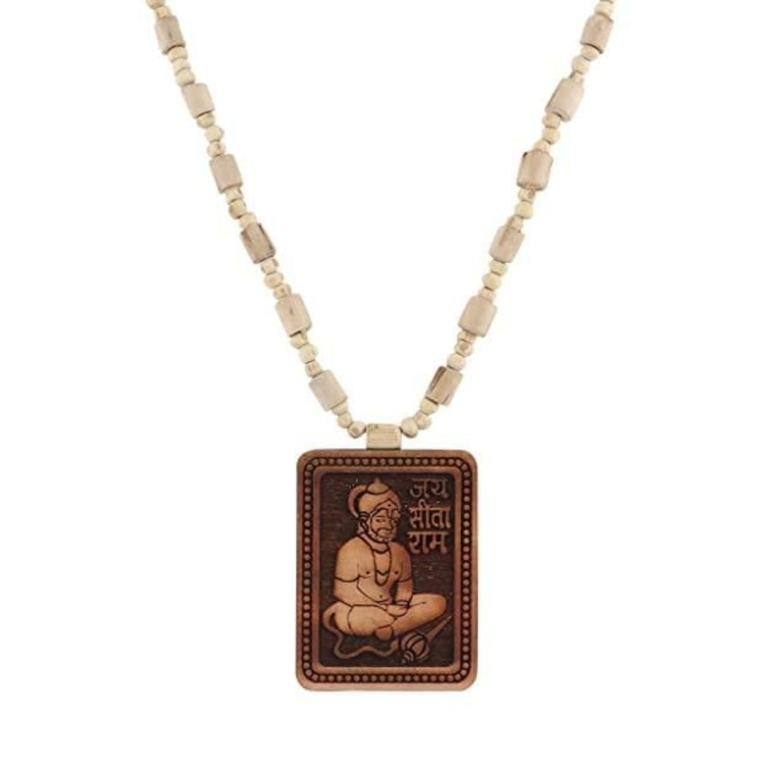 Necklace with a pendant featuring an engraved image of a seated figure on a white background