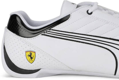 White sneaker with black accents and Ferrari logo on a white background