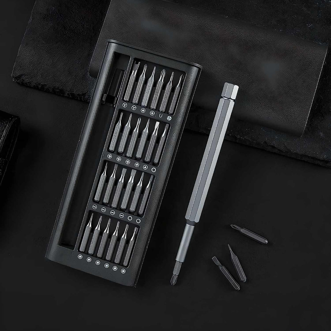 Set of screwdrivers with a black case on a dark surface