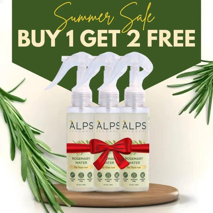 Three bottles of ALPS brand Rosemary Water Hair Spray arranged on a wooden surface with a decorative bow and rosemary leaves in the background, promoting a buy 1 get 2 free offer.