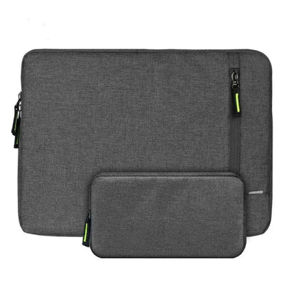 Two gray laptop sleeves with zippers on a white background