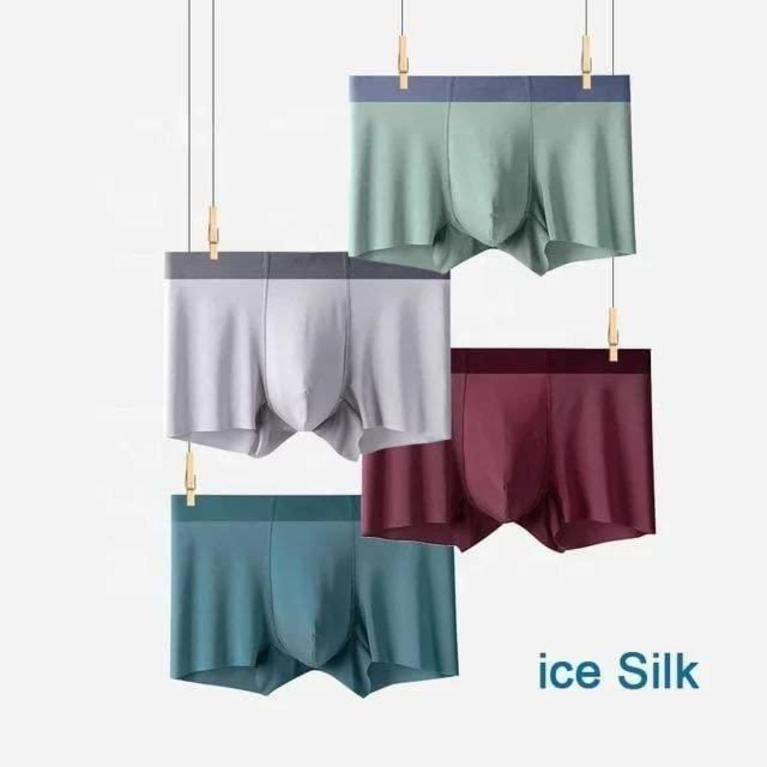 Four pairs of men's boxer briefs in green, gray, and maroon hanging on a line with 'ice Silk' branding.