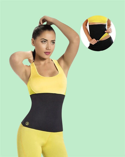 Woman wearing a black waist trainer with yellow top and pants on a light green background