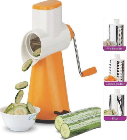 Orange and white vegetable shaver with sliced cucumbers and a bowl on a white background