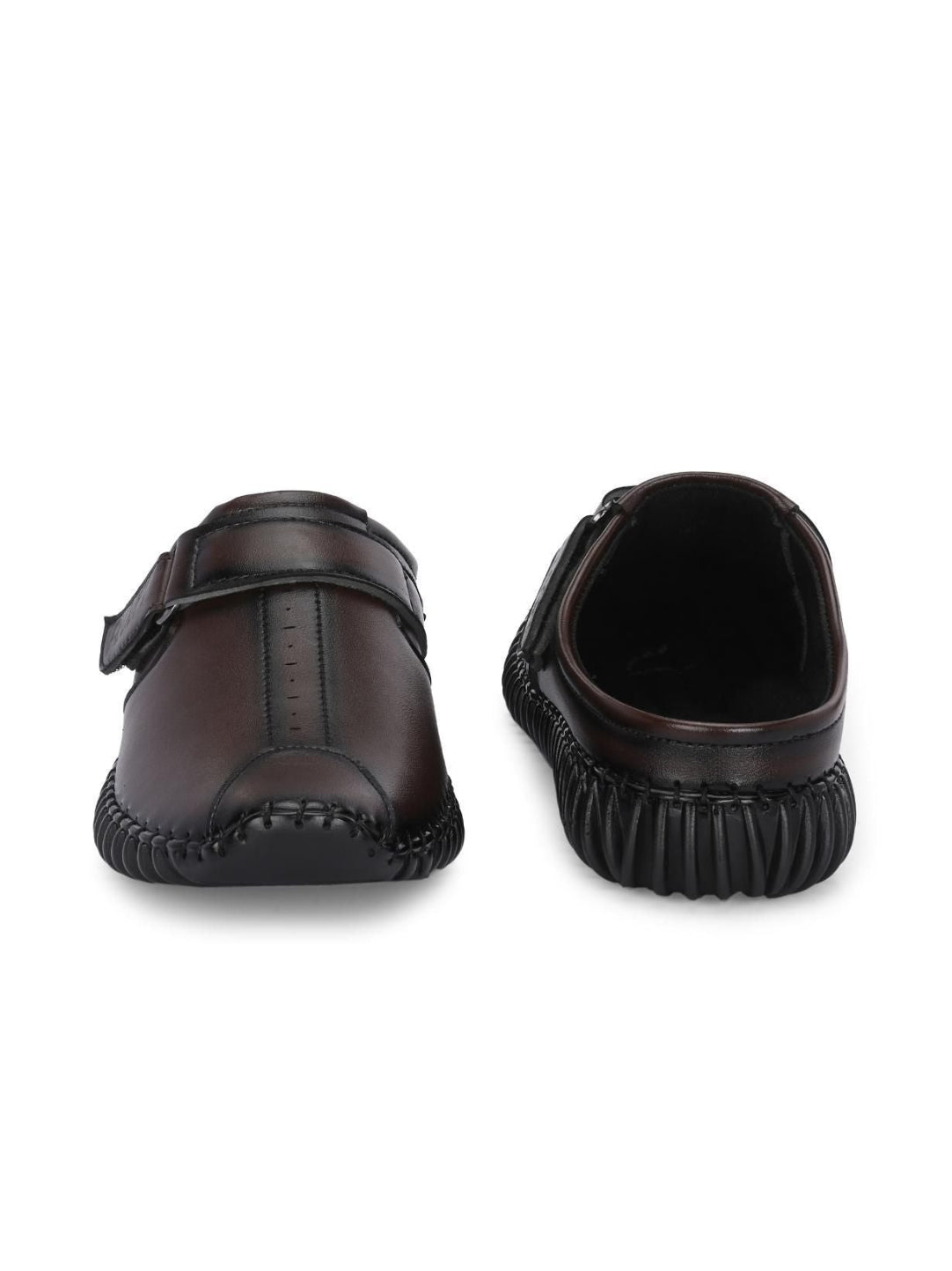 Brown leather shoes with a buckle on a white background