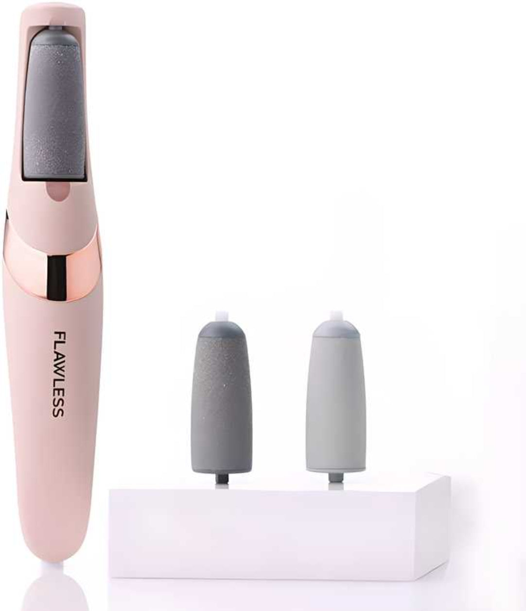 Pink nail care device with two gray replacement heads on a white background