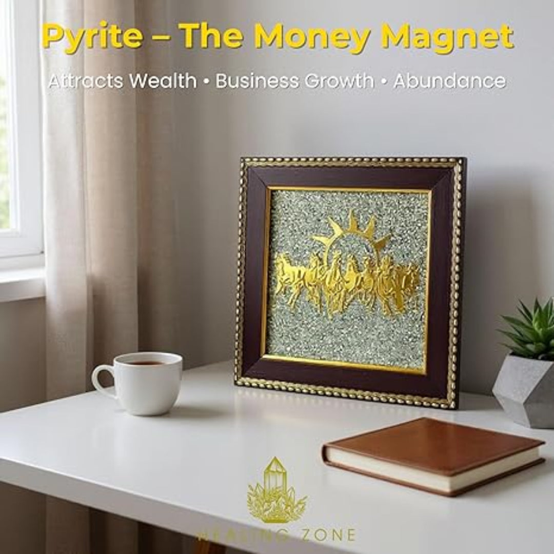 Decorative piece with text 'Pyrite - The Money Magnet' on a table with a cup and book.