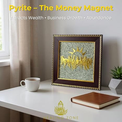 Decorative piece with text 'Pyrite - The Money Magnet' on a table with a cup and book.