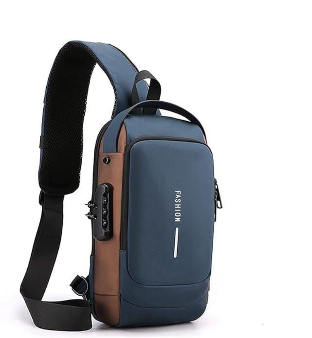 Blue and brown sling bag with USB port on a white background