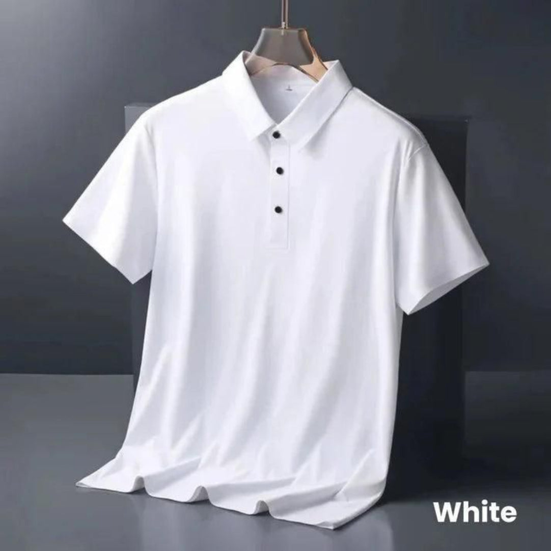 White polo shirt on a mannequin against a dark background