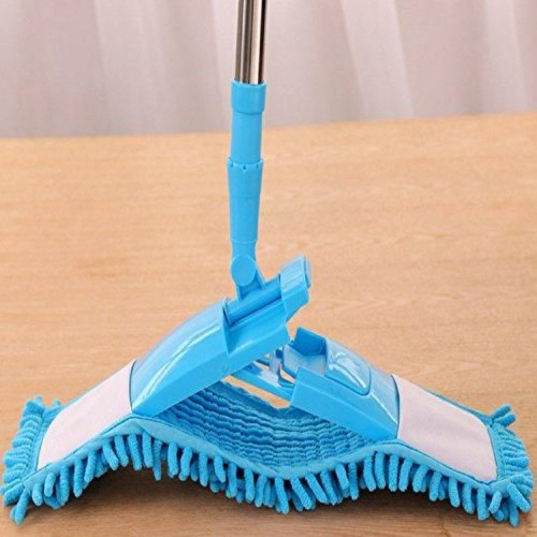 Blue microfiber mop on a wooden surface with a neutral background