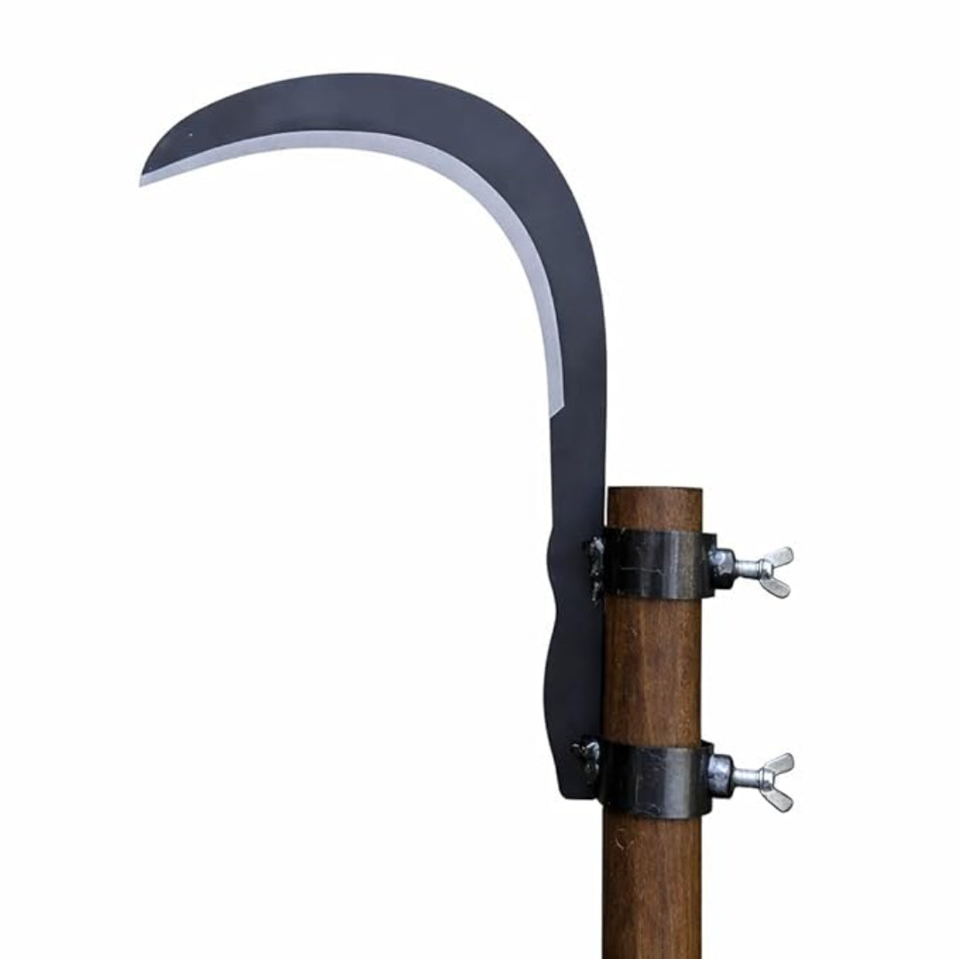Sickle with wooden handle on a white background