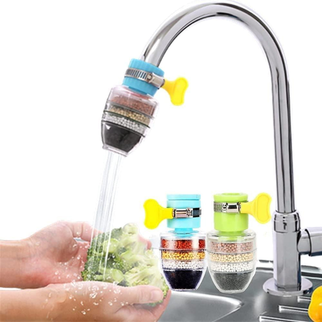 Faucet with a water filter attachment and vegetables being washed.