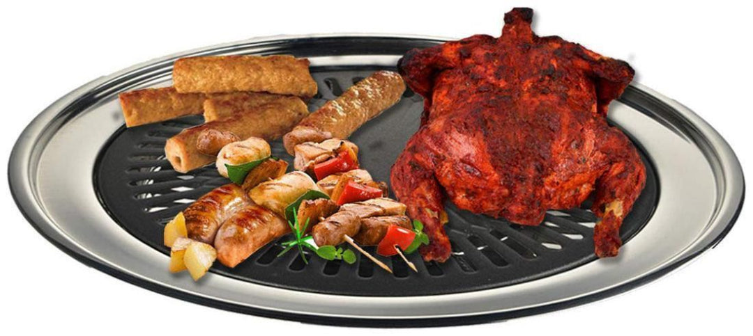 Grill pan with roasted chicken, sausages, and skewered vegetables on a white background