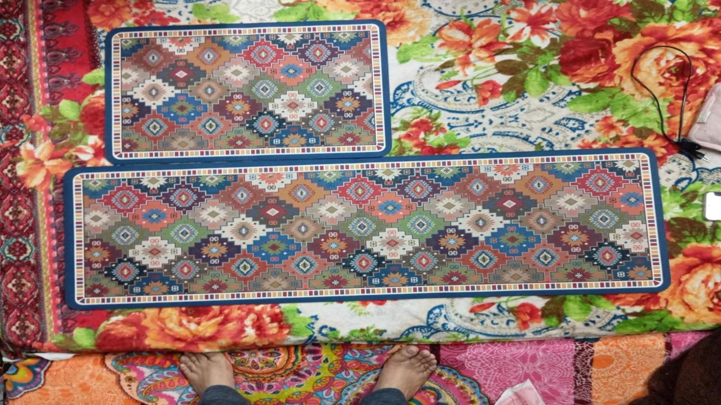 Two decorative rugs with geometric patterns on a colorful floral fabric background.