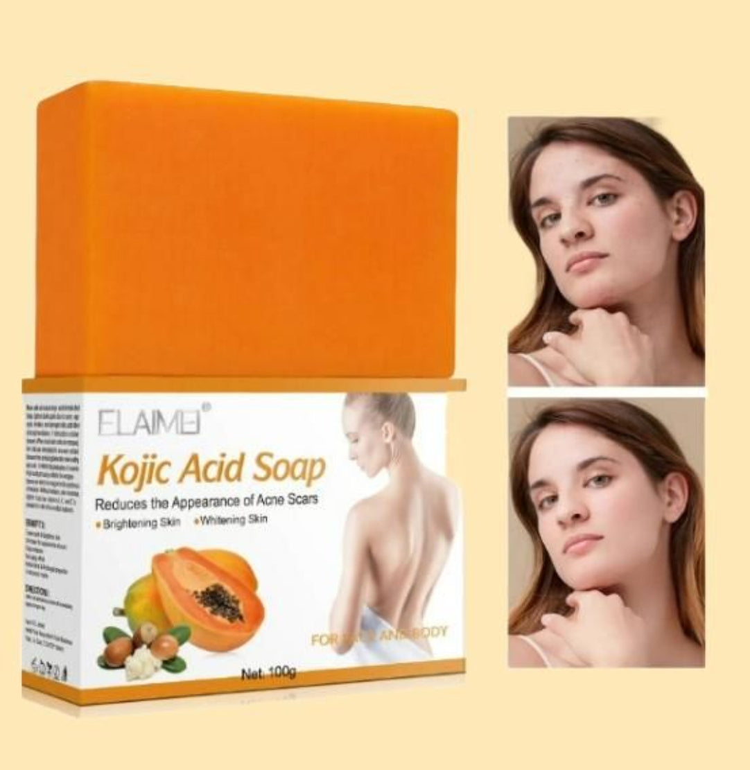 Kojic Acid Soap packaging with images of a woman and a papaya on a beige background