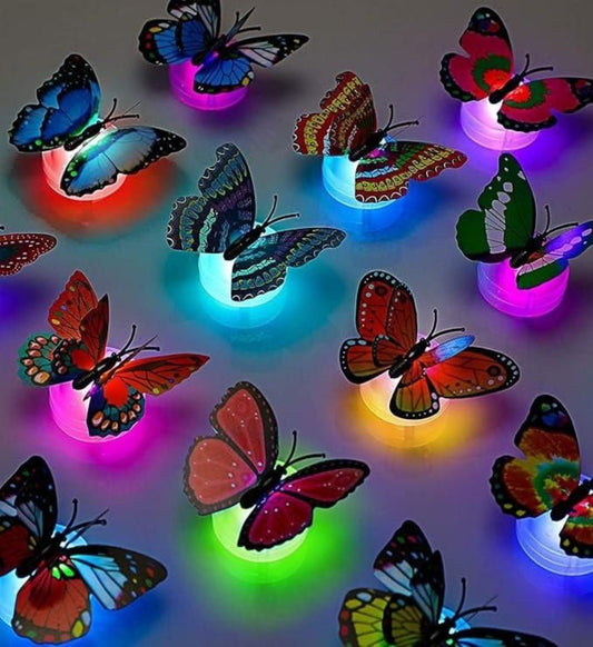 A collection of colorful 3D butterfly-shaped LED lights illuminating in various colors.