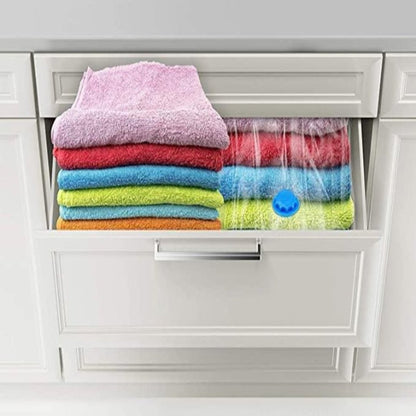 Reusable Vacuum Storage Space Saver Bags (Pack of 4) with pump .