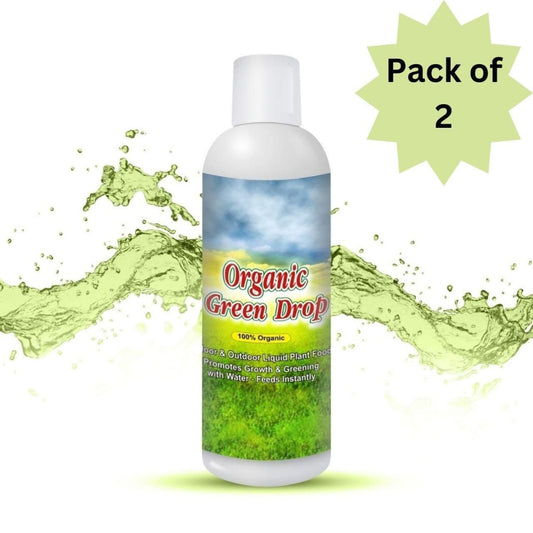 Bottle of Organic Green Drop with a splash of green liquid on a white background