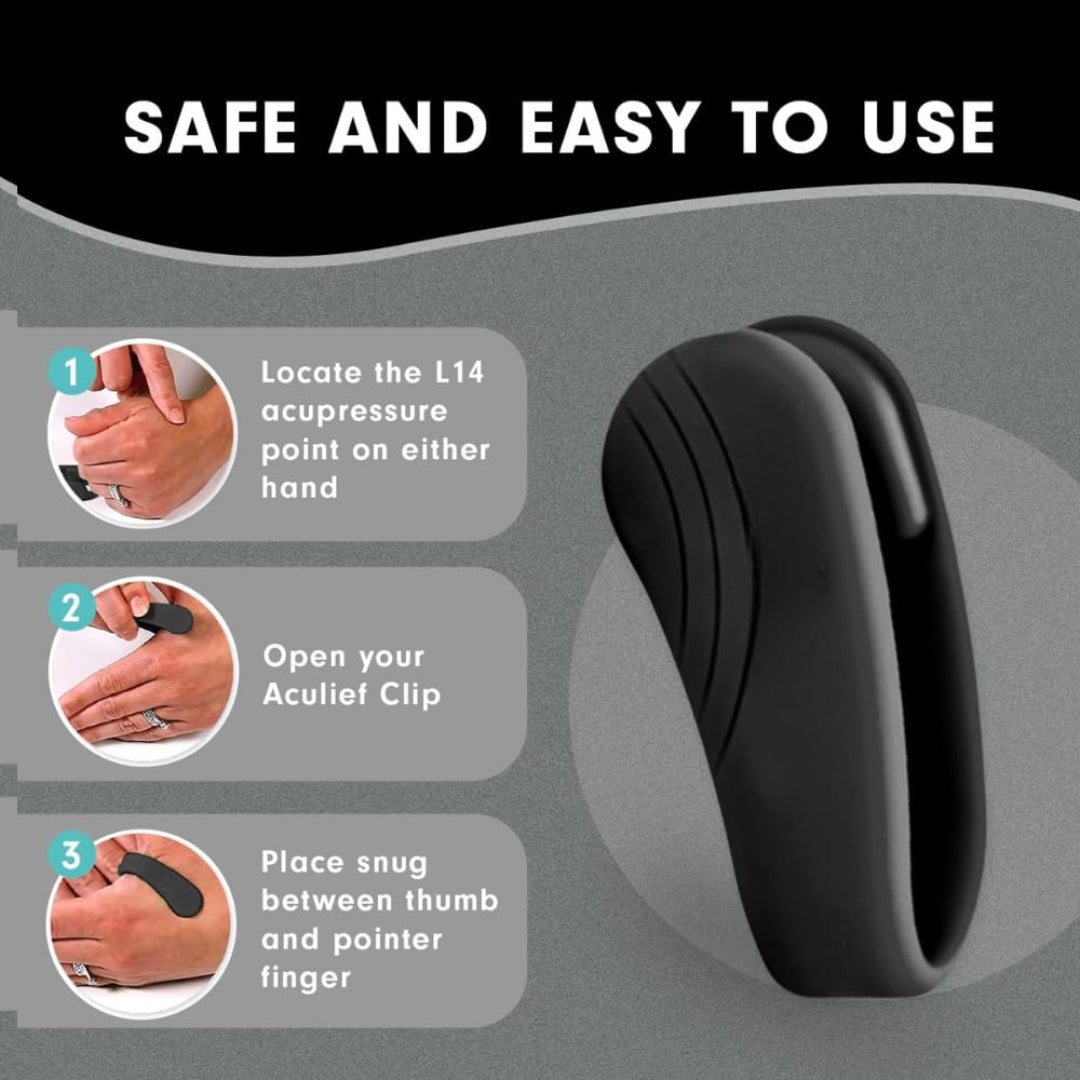 Black acupressure clip with usage instructions on a gray background