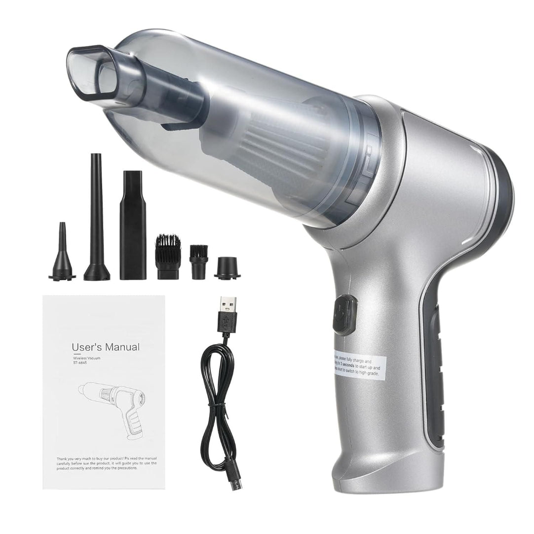 Silver handheld vacuum cleaner with attachments and user manual on a white background