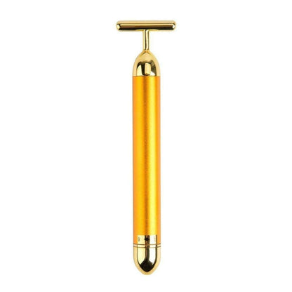 Gold handheld device on a white background