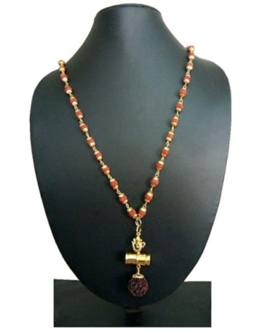 Necklace with red beads and gold accents on a black mannequin bust