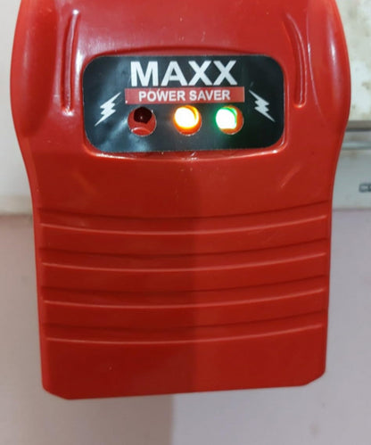 Red 'MAXX Power Saver' device with two indicator lights on a white background