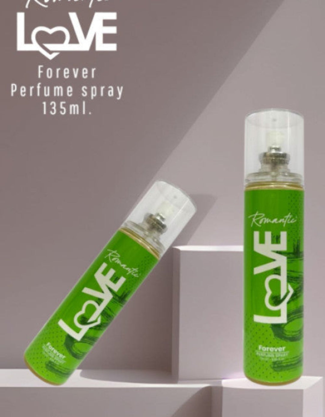 Two green 'LOVE' perfume sprays on a white platform with a gray background