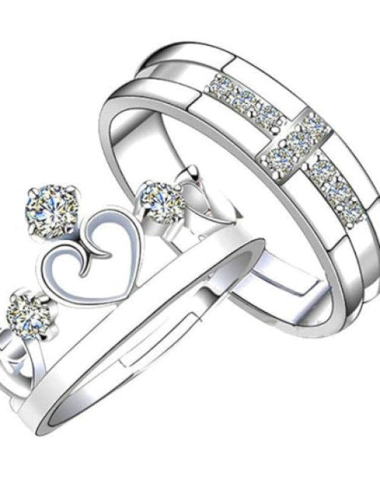 A set of sterling silver couple rings with Swarovski elements, featuring an adjustable design.