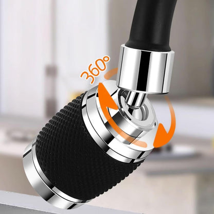 360-degree swivel faucet handle with black and silver design on a blurred background