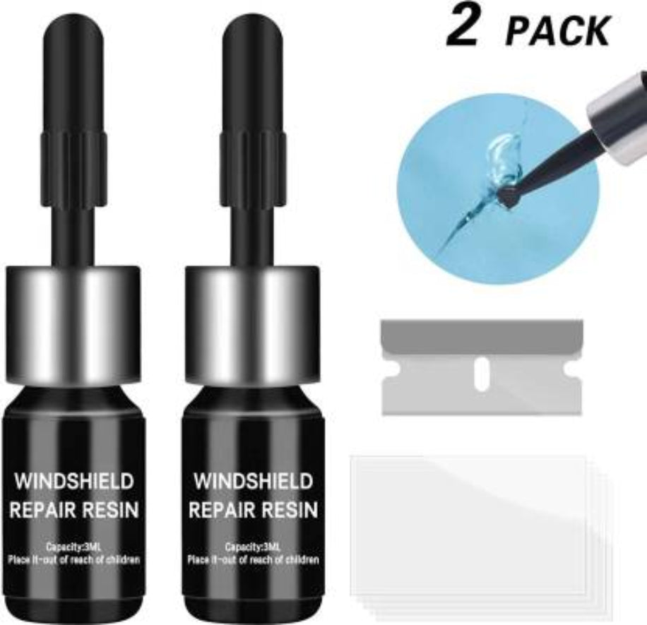 Two bottles of windshield repair resin with application tools on a white background